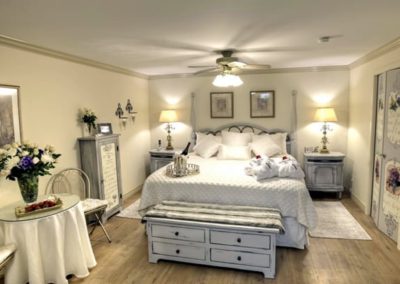 Royal Honeymoon Suite solid pine king-sized bed has a tempurpedic foam mattress topper.